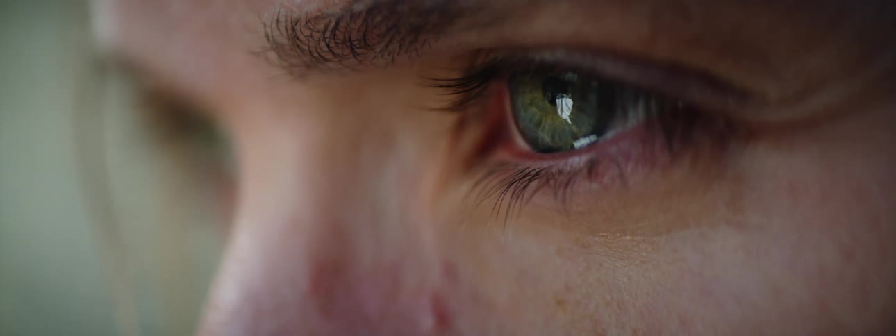 Close up of womans gray eyes
