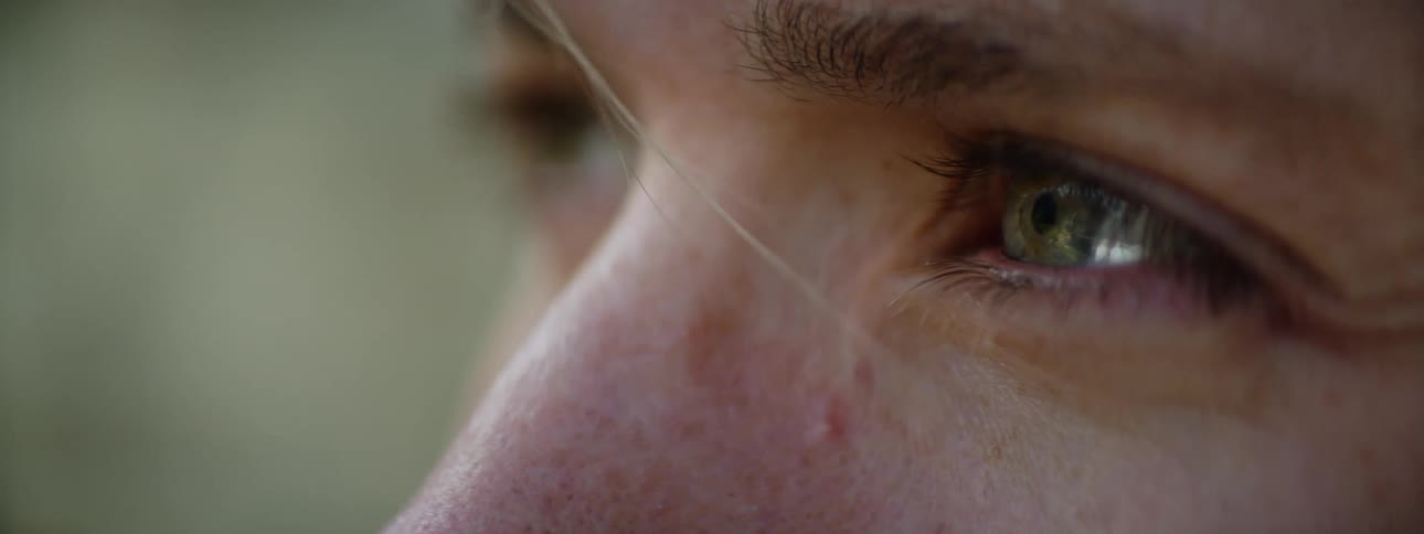 Intense Gaze of a Woman with Gray Eyes