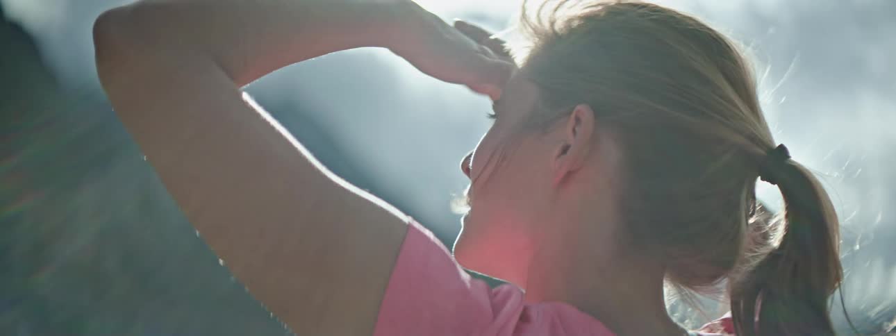 A woman looking at the view of nature outdoors in spring