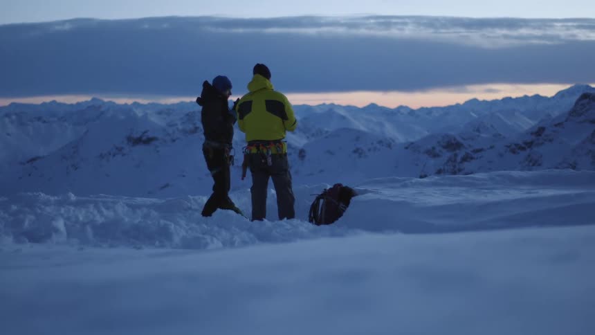 Snowy Mountain Retreat: Enjoying a Drink Amidst Serene Landscape