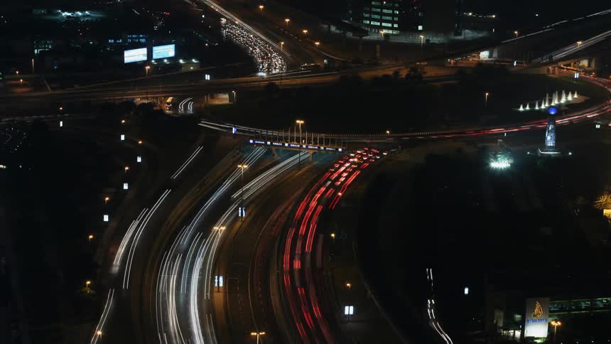 Time lapse view of cars driving in a downtown city