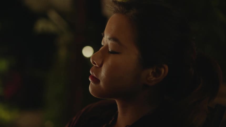 A beautiful young lady lost in deep thought contemplating and introspecting