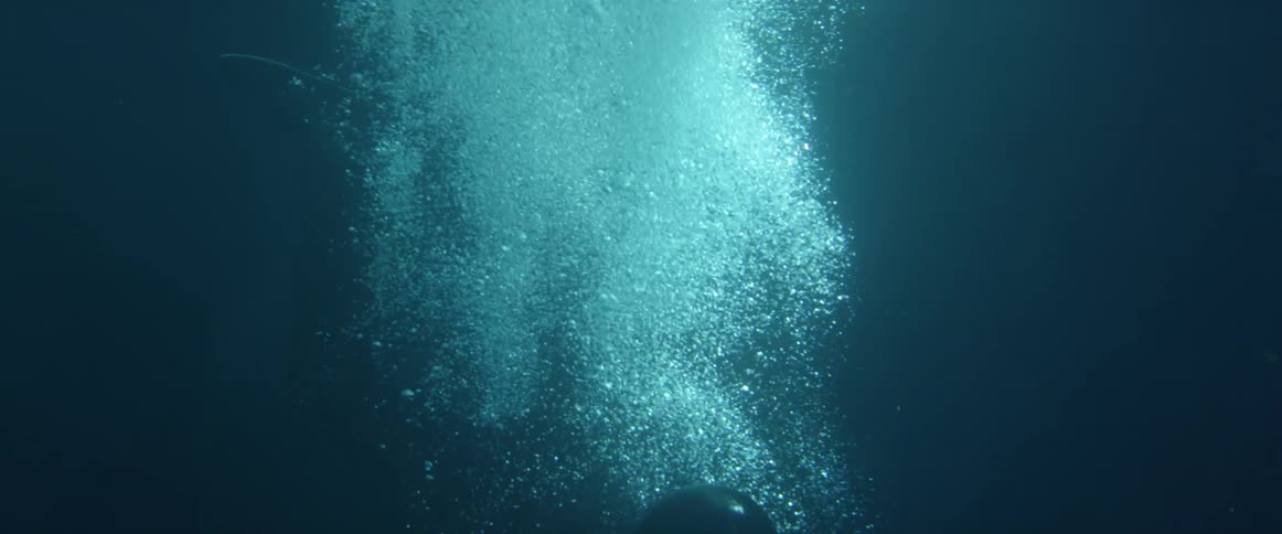 A person sinks in the water