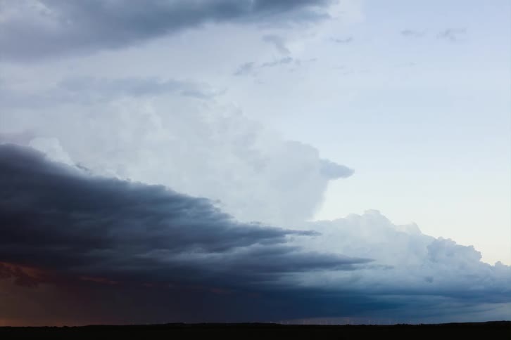 Dark clouds float in the sky