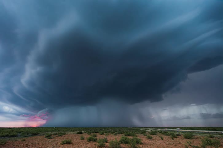 A supercell thunderstorm drops tons of rain and hail in monster downbursts