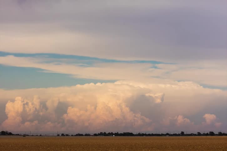 Huge storm clouds move in the distance