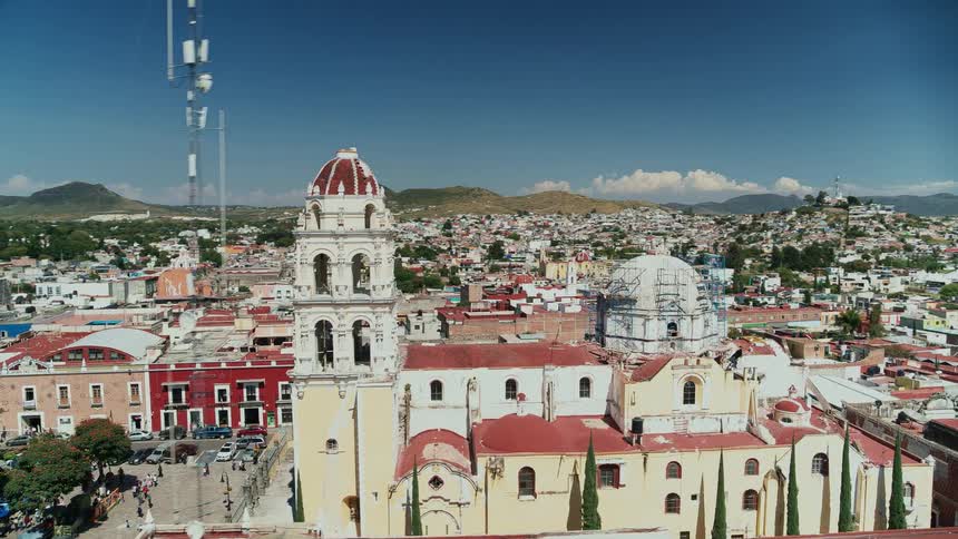 Aerial view of church and houses in the city