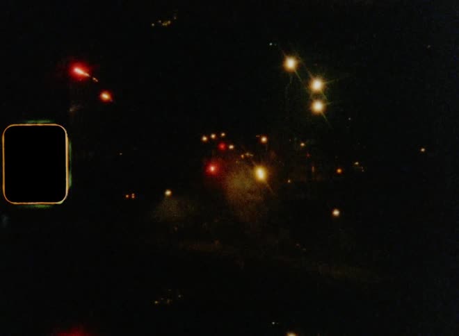 Fireworks going off in different directions on the street on New Year’s Eve