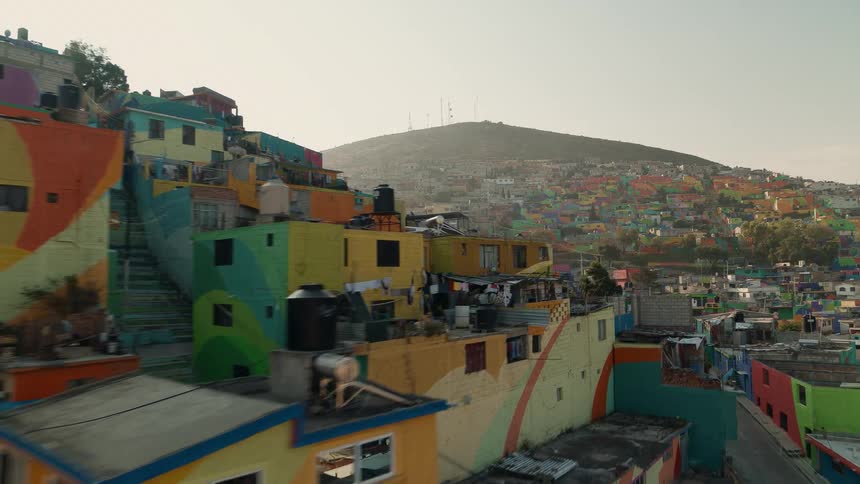 Aerial view of houses colored in bright colors in the neighborhoods