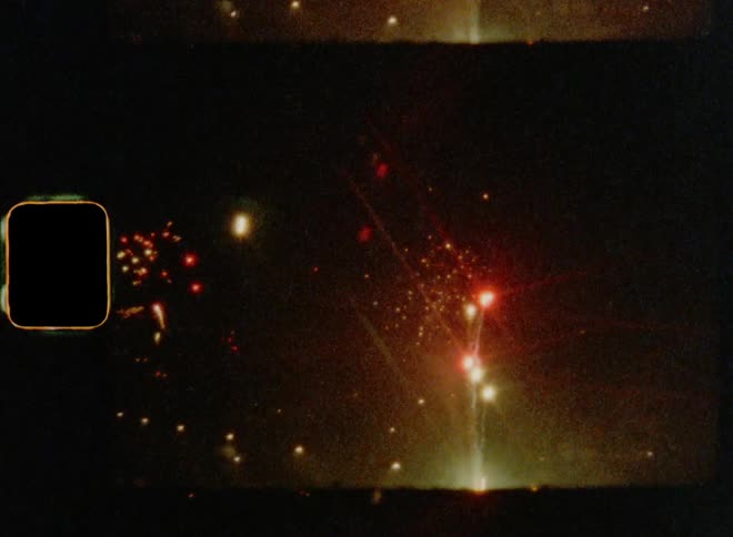 Film footage of a fire work show at night expressing happiness and freedom during a celebration