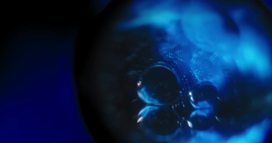 A close up of a blue spherical object