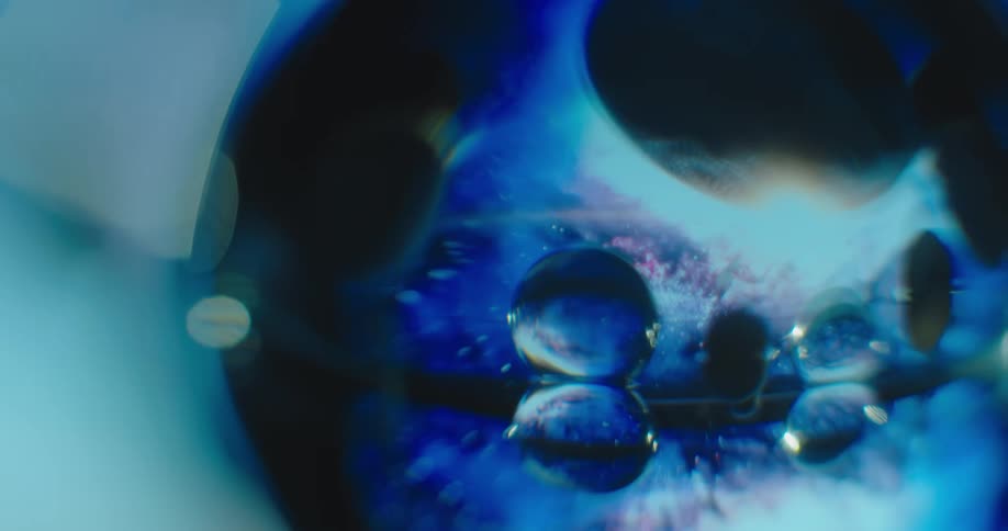An up close of a blue spherical object with astronomical features