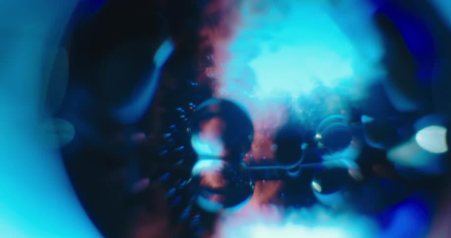 An up close of a blue spherical object slowly rotating
