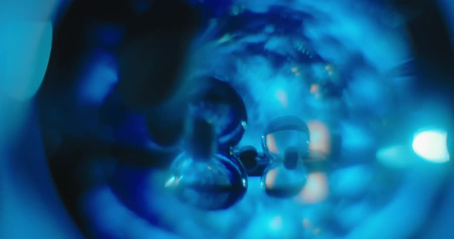 A close up of a blue abstract piece of art rotating