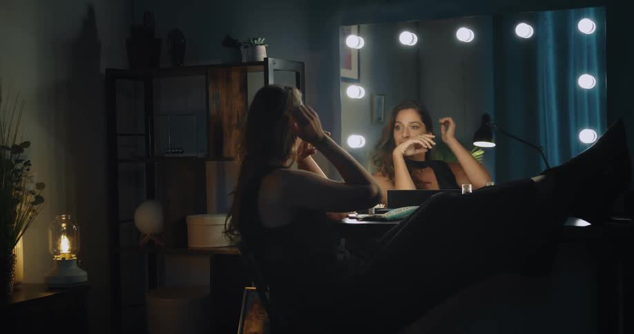 A woman takes a selfie in the dressing room