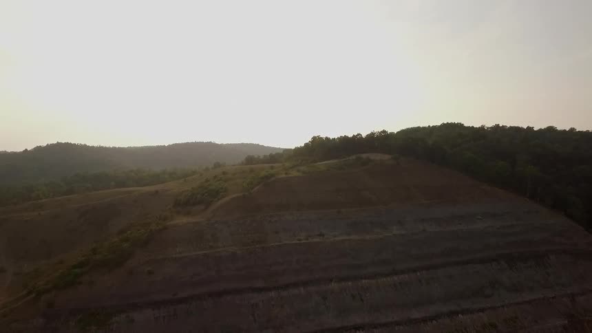 The sun is setting over these hills