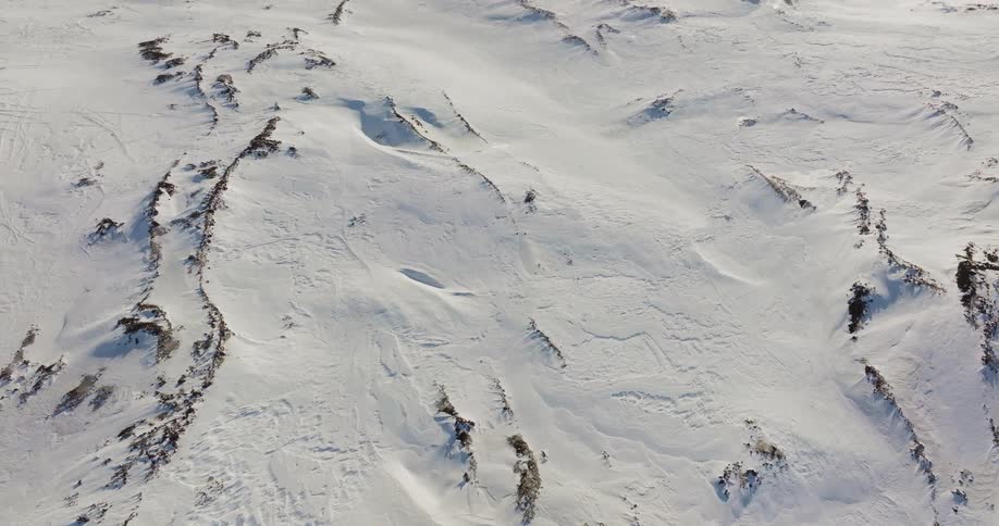 Aerial view of snowy mountain slope