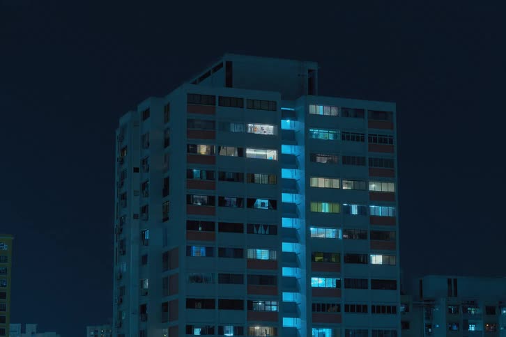 The lights flicker and blink in the apartment building