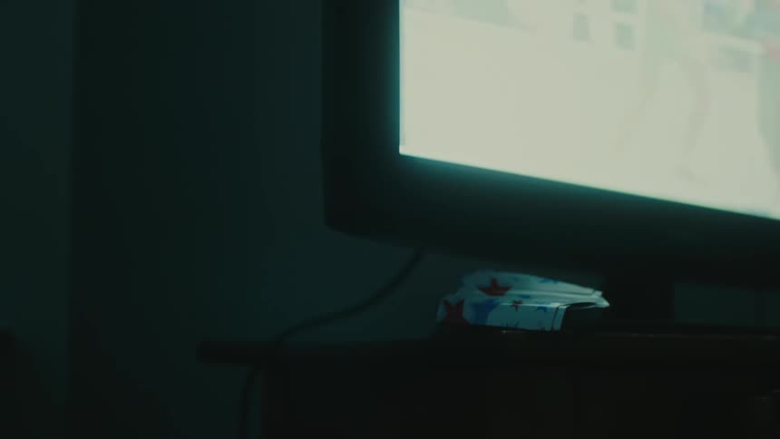 The television is displaying a show