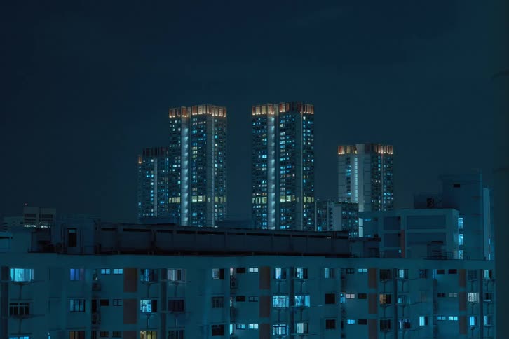 City lights flickering from buildings and skyscrapers at night