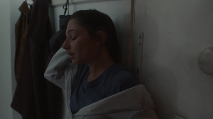 A woman entered her house during the daytime