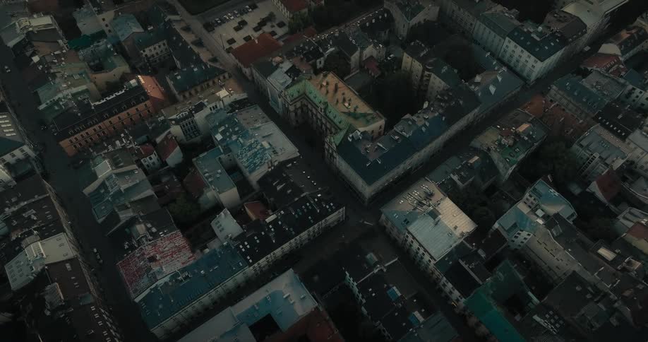 Aerial view of buildings in a downtown city is displayed