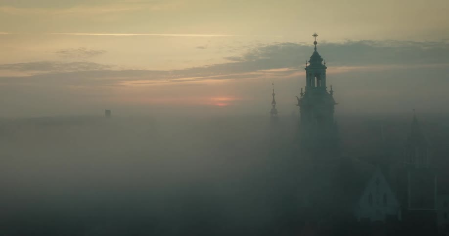 An aerial view of a city with tall towers