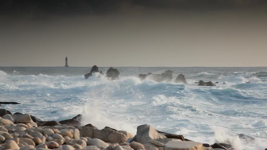 Waves roll onto a rocky beach