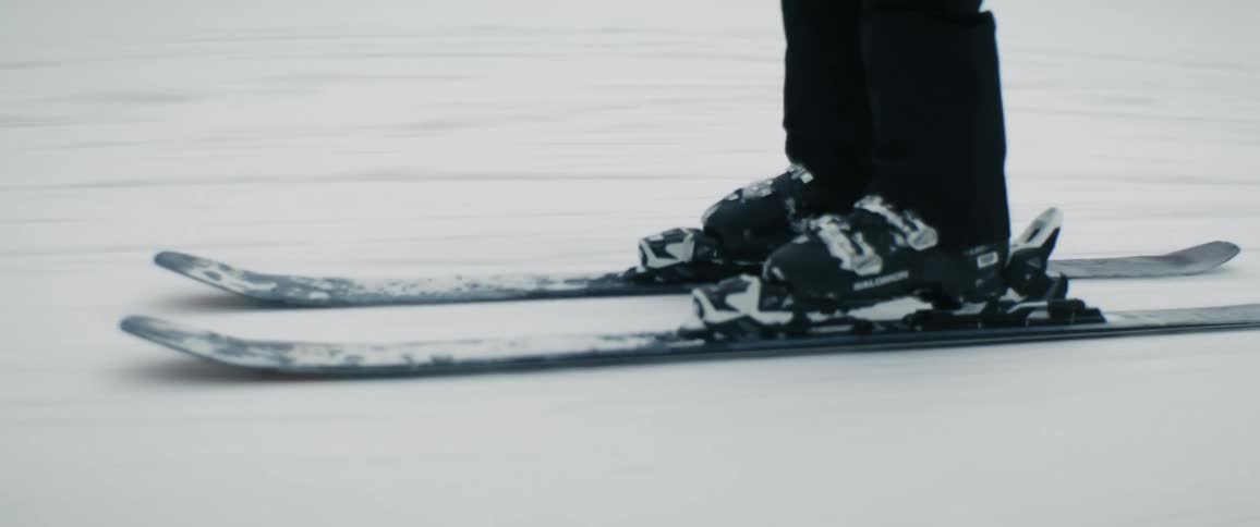 The view is of someone skiing in the winter time