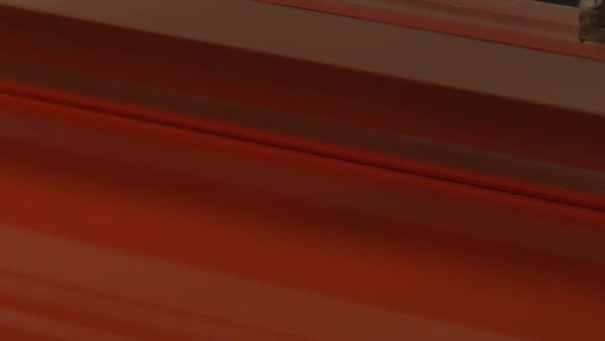 A printing press spreads ink