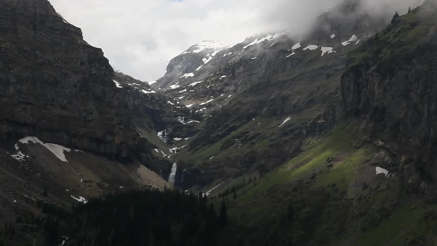 Clouds cover a mountain top