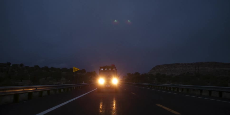 Time lapse of a vehicle driving on a rural road