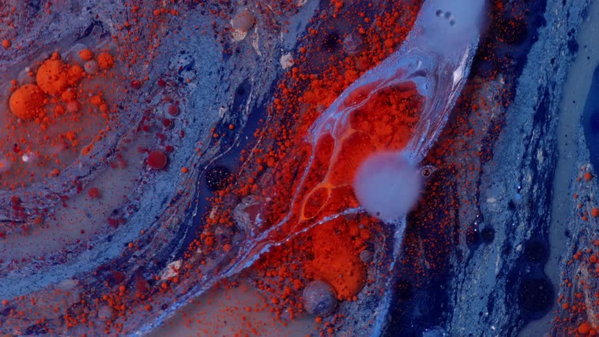 Blue and red paint mixing and moving