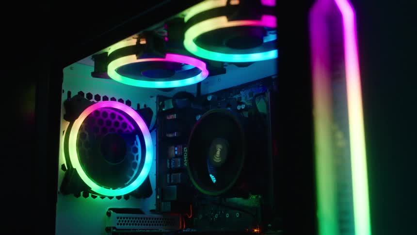 A computer unit with multicolored fans and processors