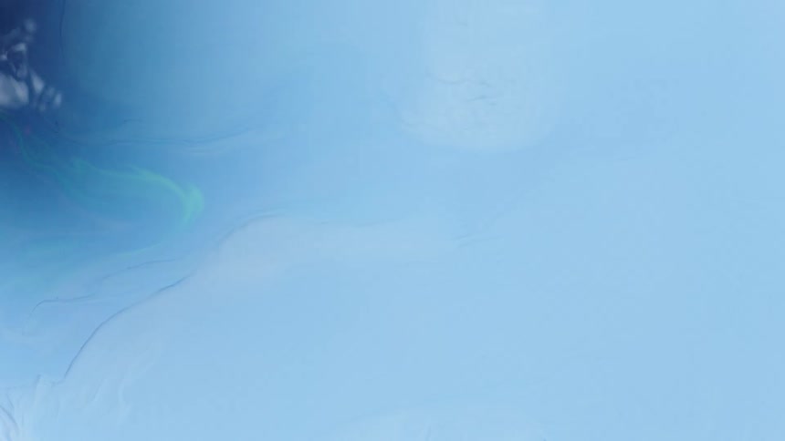 Abstract light blue paint flowing