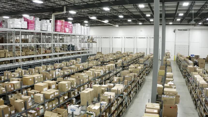 An aerial of a factory with shelves covered in boxes
