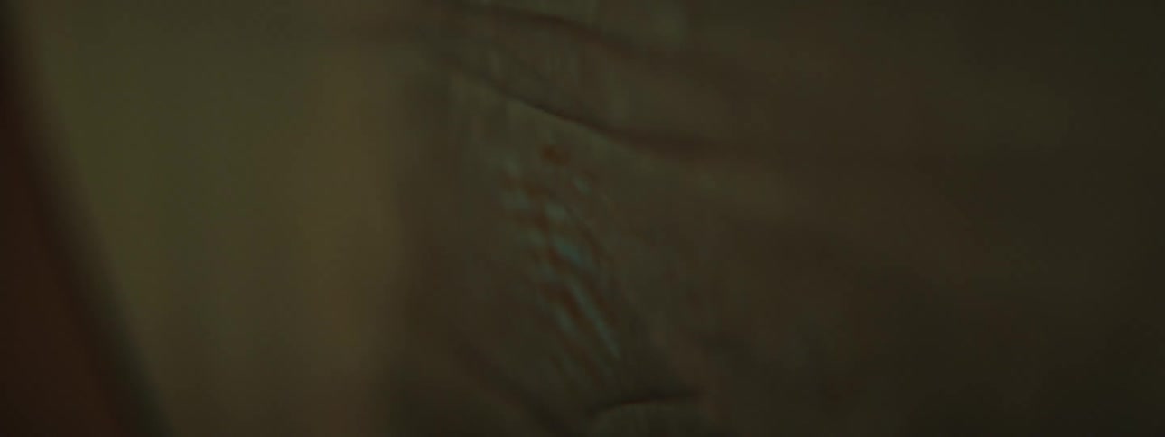 Extreme close up of the textured surface of a brown cloth waving in the wind