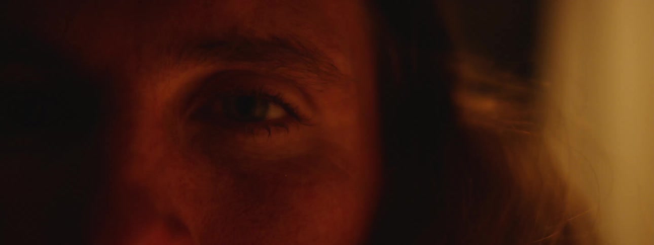 Close up view of a mans face is displayed