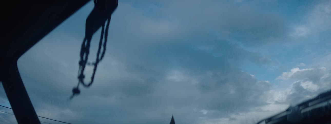 A camera inside a vehicle aimed at the sky