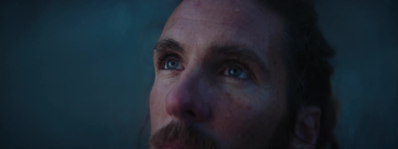 Close up view of a mans face is displayed