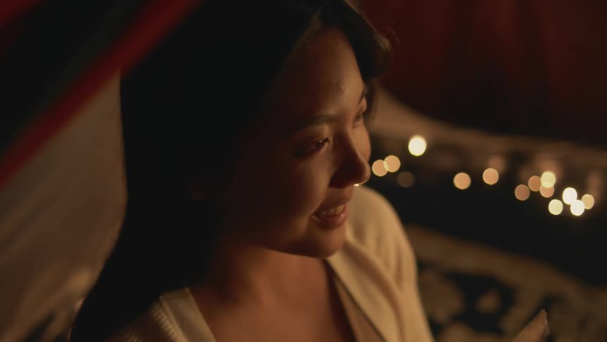 A young woman is smiling and looks really happy