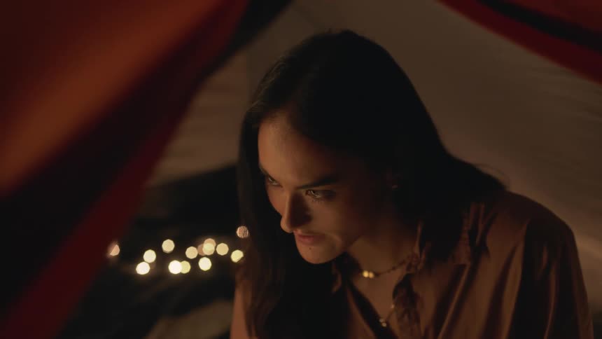 A woman is talking in the tent