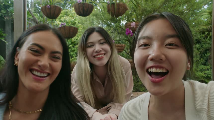 Friends are outdoors and they are hanging out