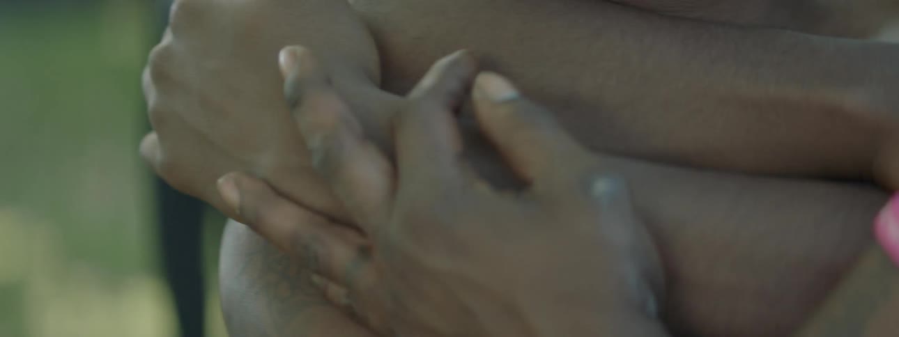 Two people have their arms wrapped around each other