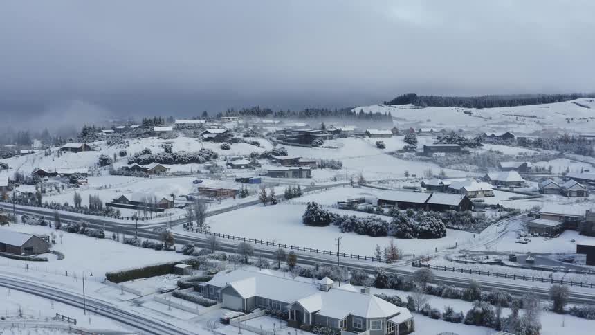 Aerial view of a suburban city during winter