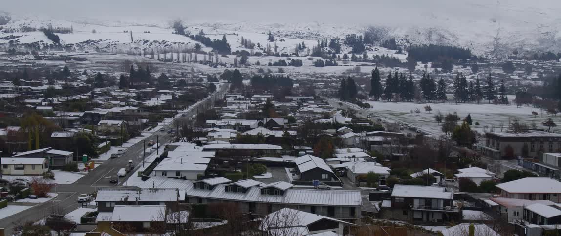 Aerial view of a suburban town during the winter season
