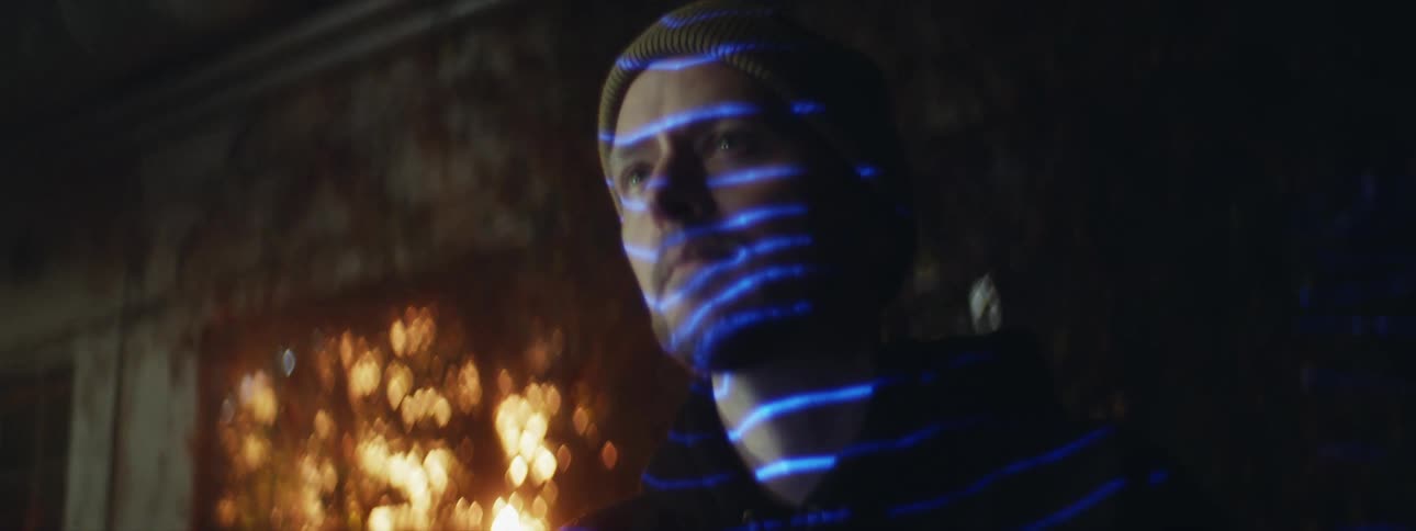 A close up of a man with lines on his face