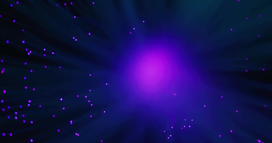 A bright pink sphere glows purple in the darkness among many illuminated dots in the darkness