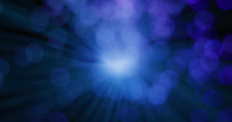 A close up of a colorful laser rotating around