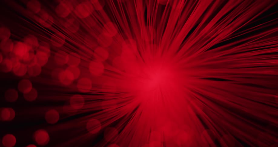 A red swirling image of lines and dots